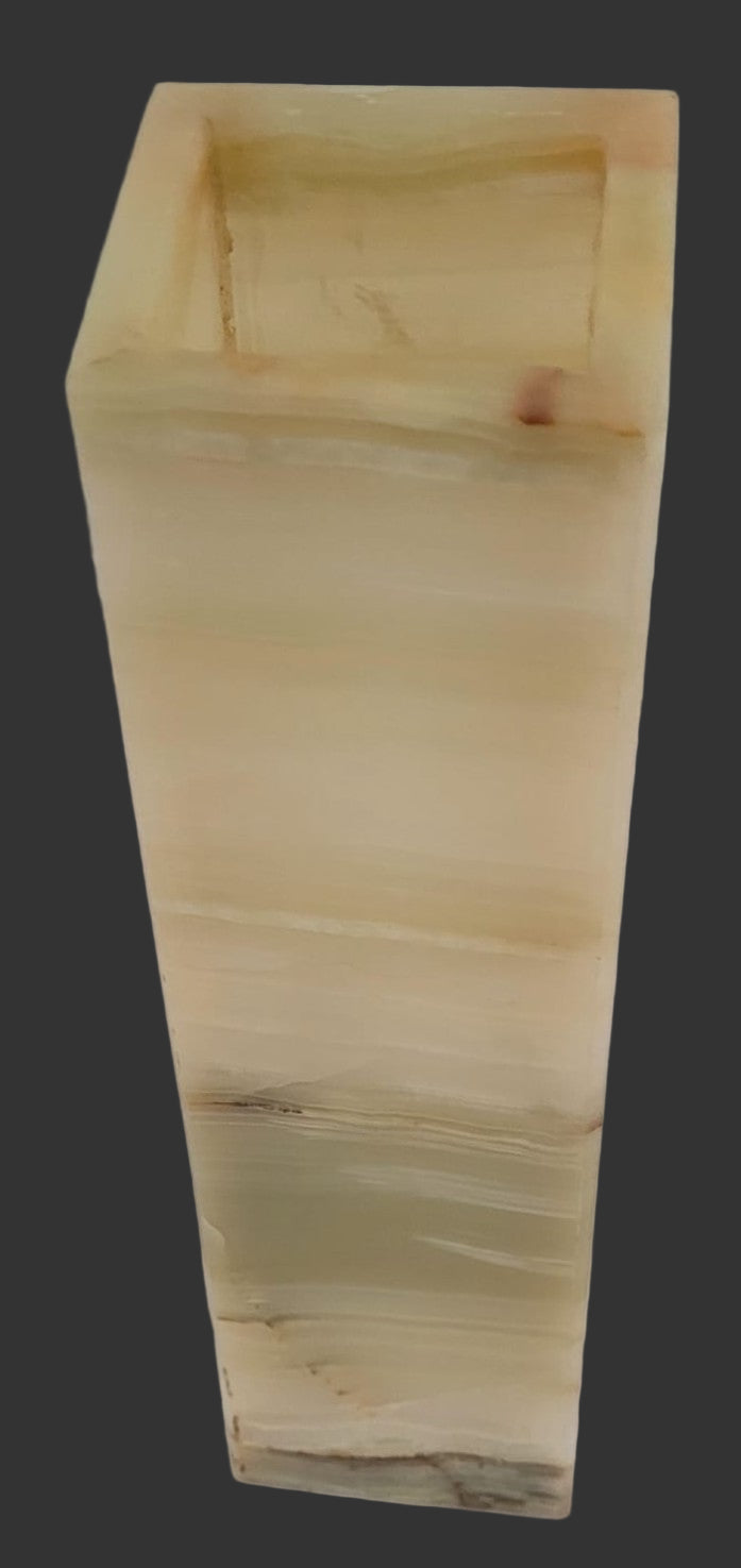 Rectangular wooden planter with a natural finish on a black background