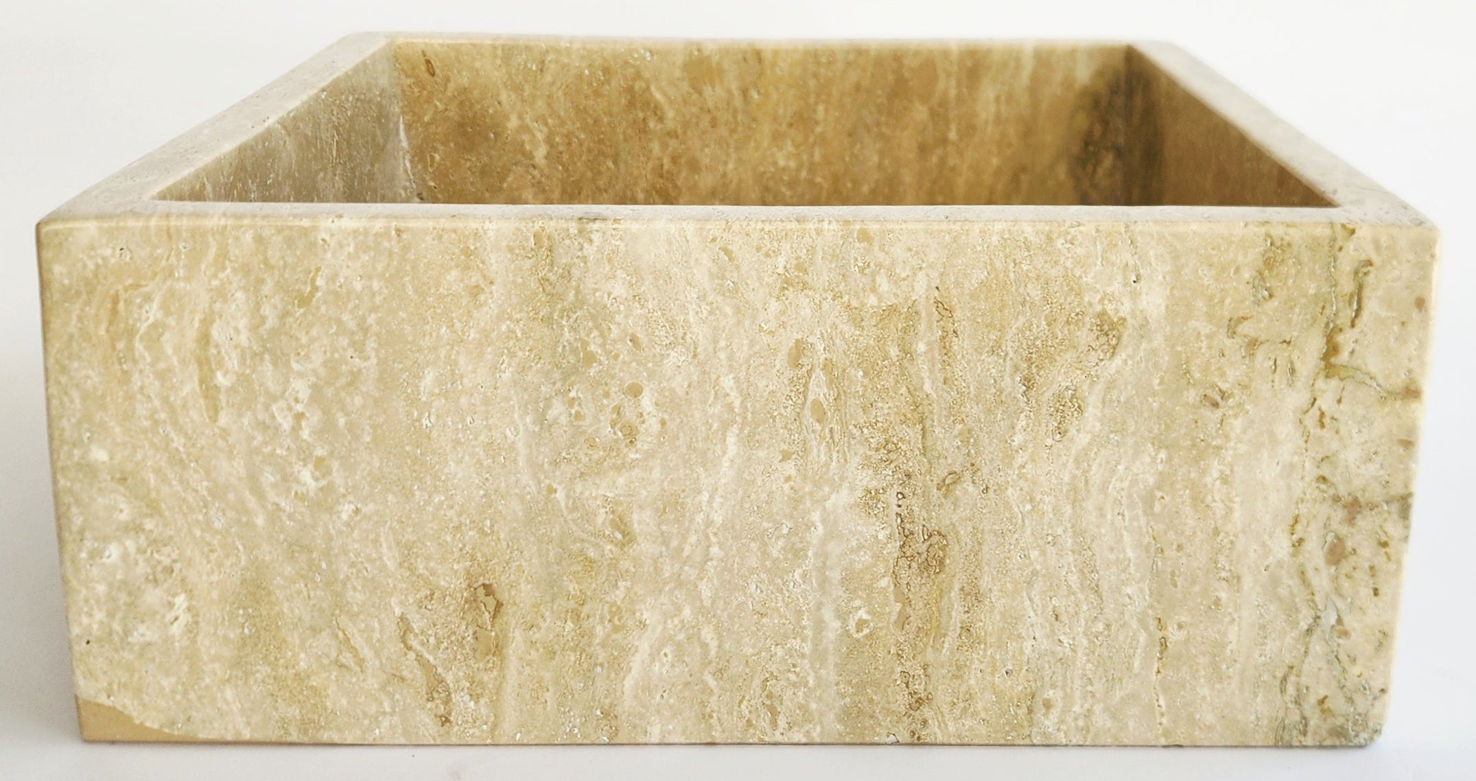 Beige stone square planter on a white background