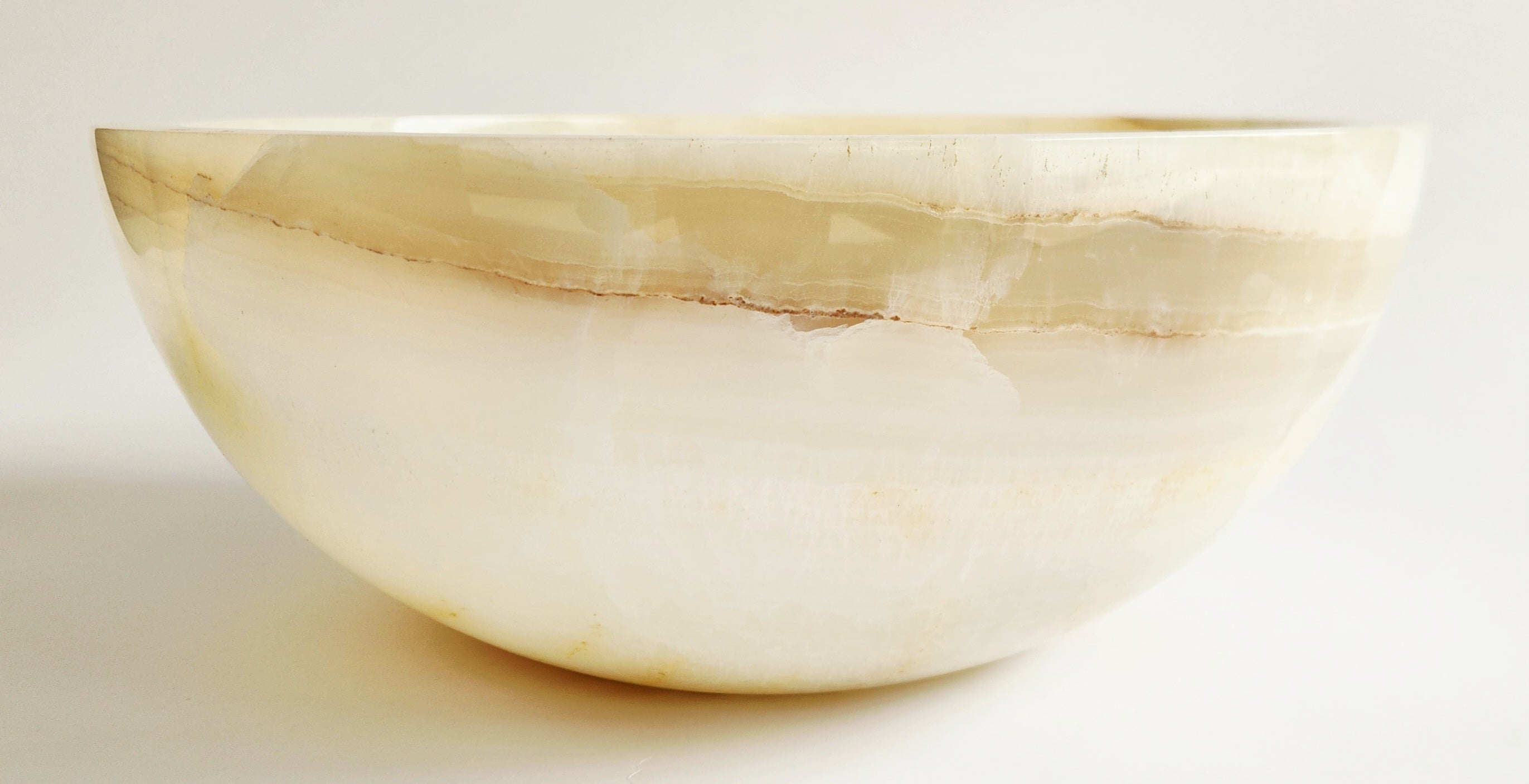 White marble bowl on a light gray background