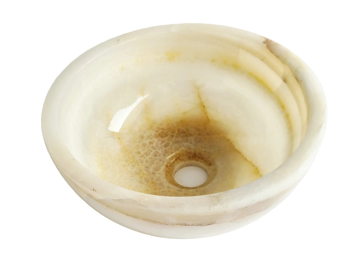 Decorative stone bowl with natural patterns on a white background